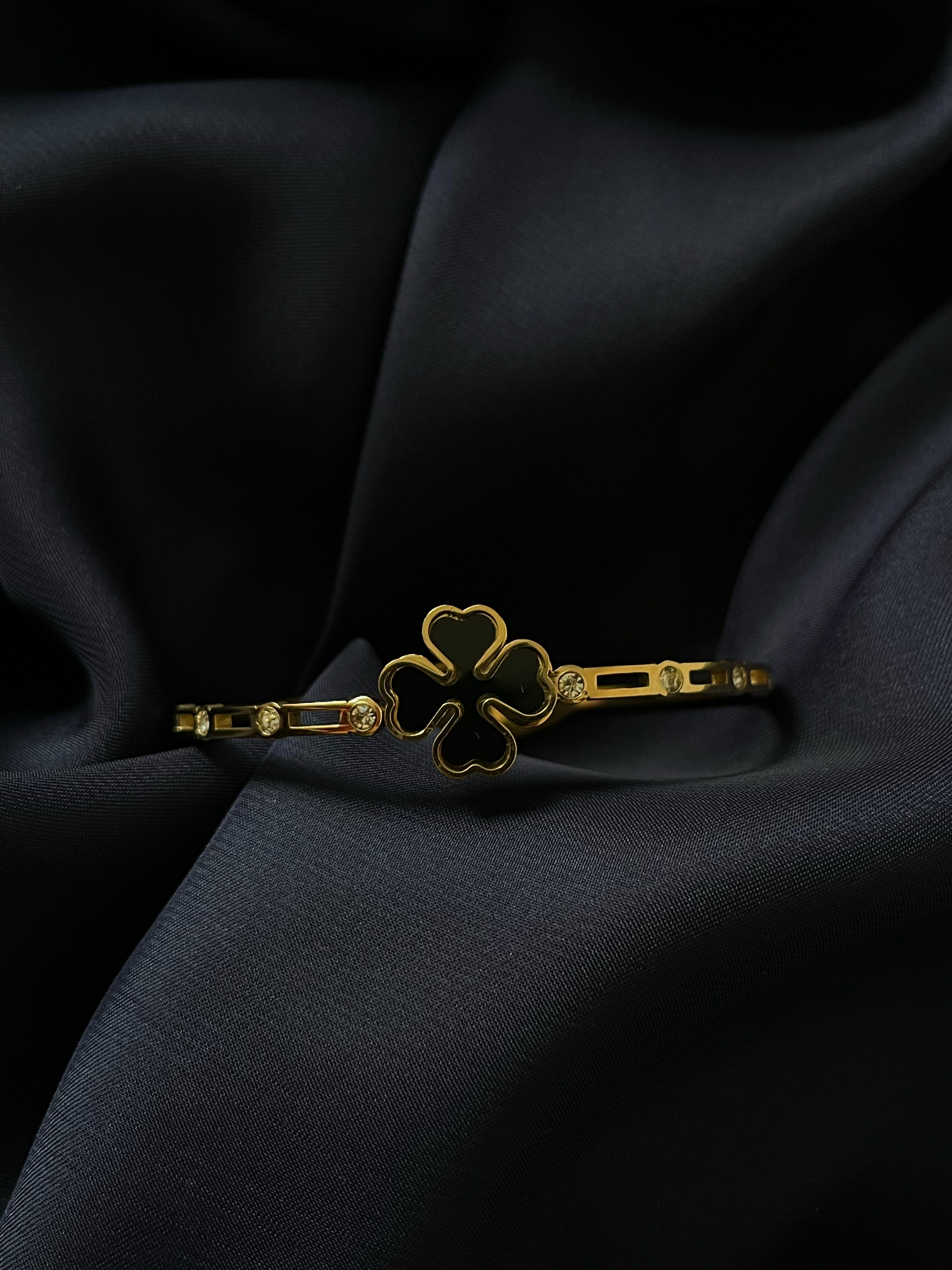 Gold Bracelet with Black Stone Flower