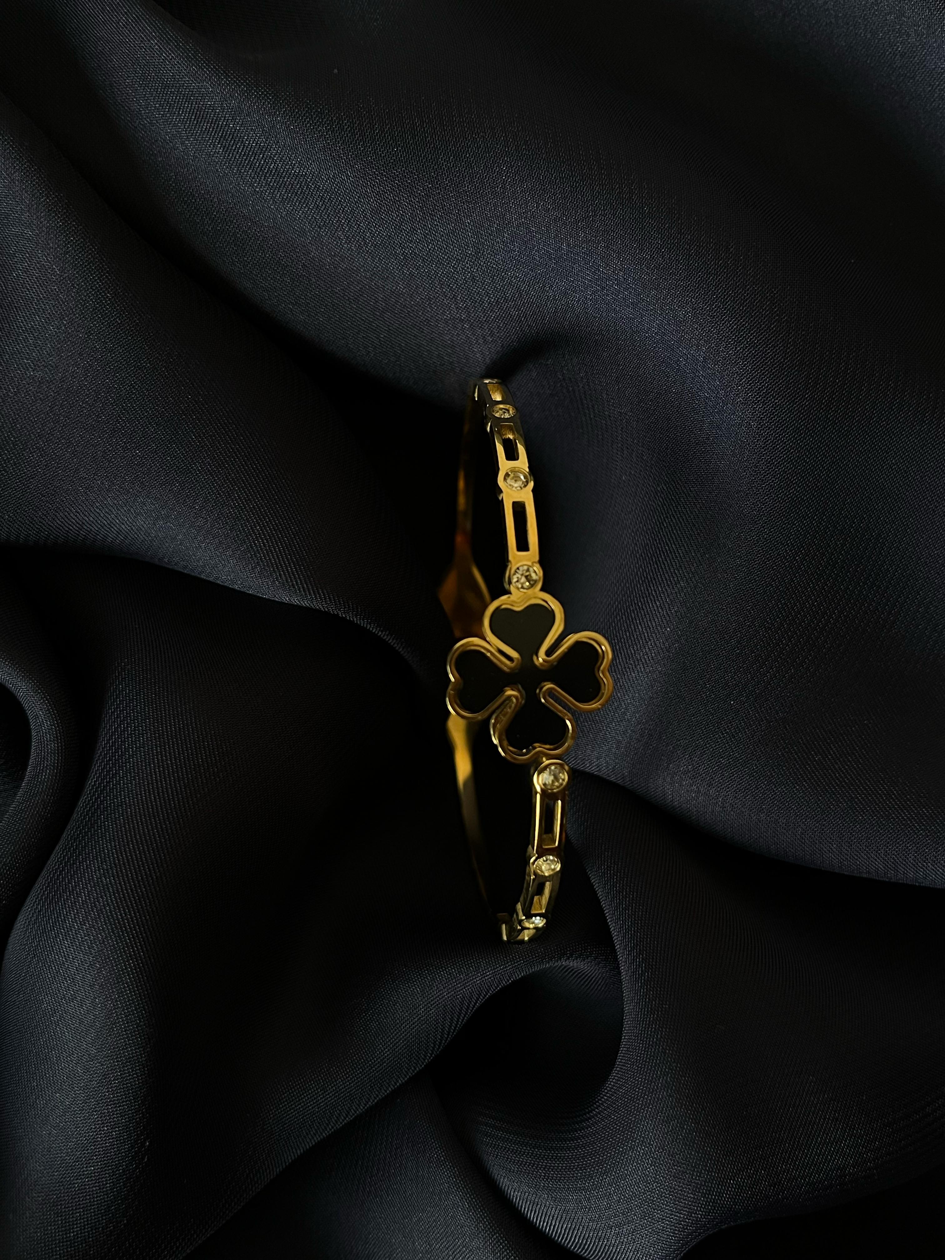 Gold Bracelet with Black Stone Flower