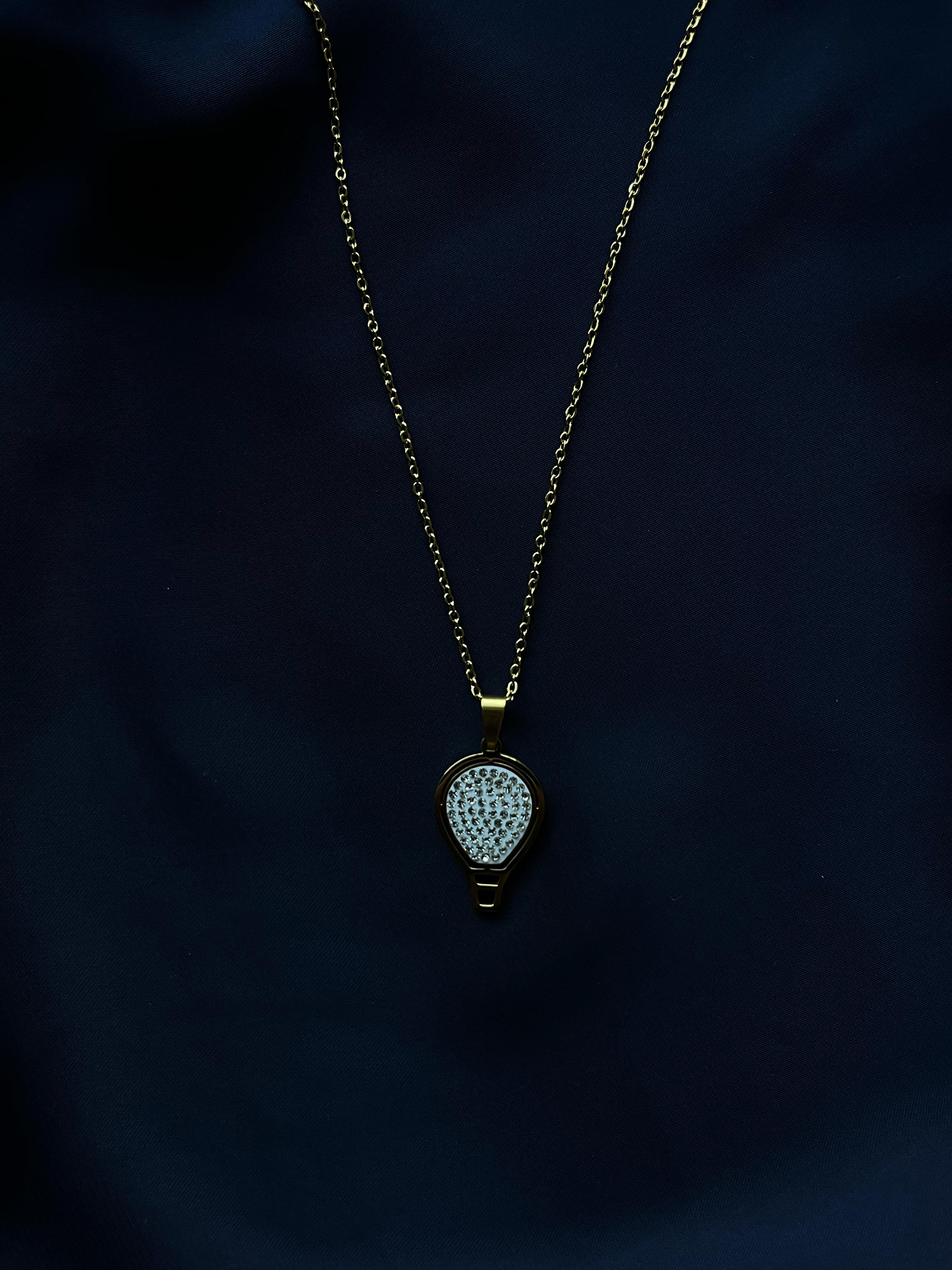 Golden Pendant with Oval Silver Stone